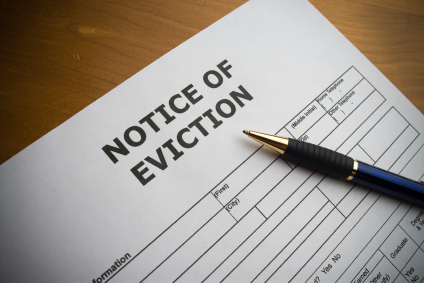 Eviction notice on desk with pen