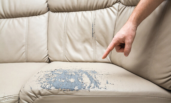 Sofa with damage recorded on the landlord inventory