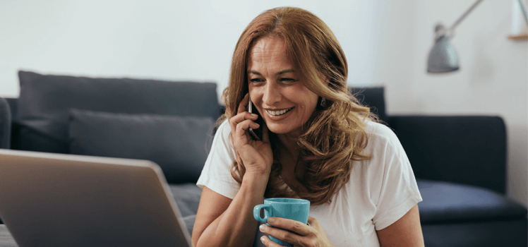 A happy woman booking her landlord inventory