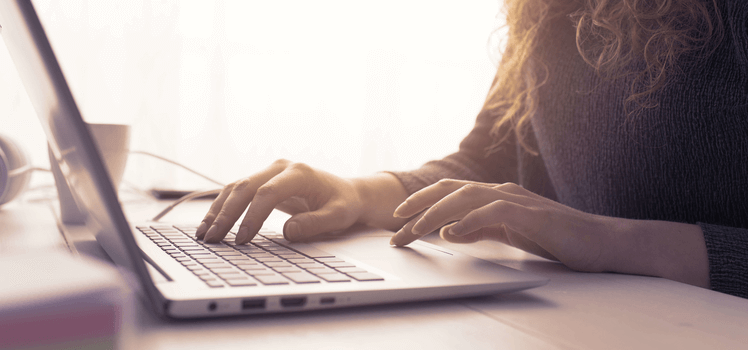 Becoming a landlord takes research on laptop